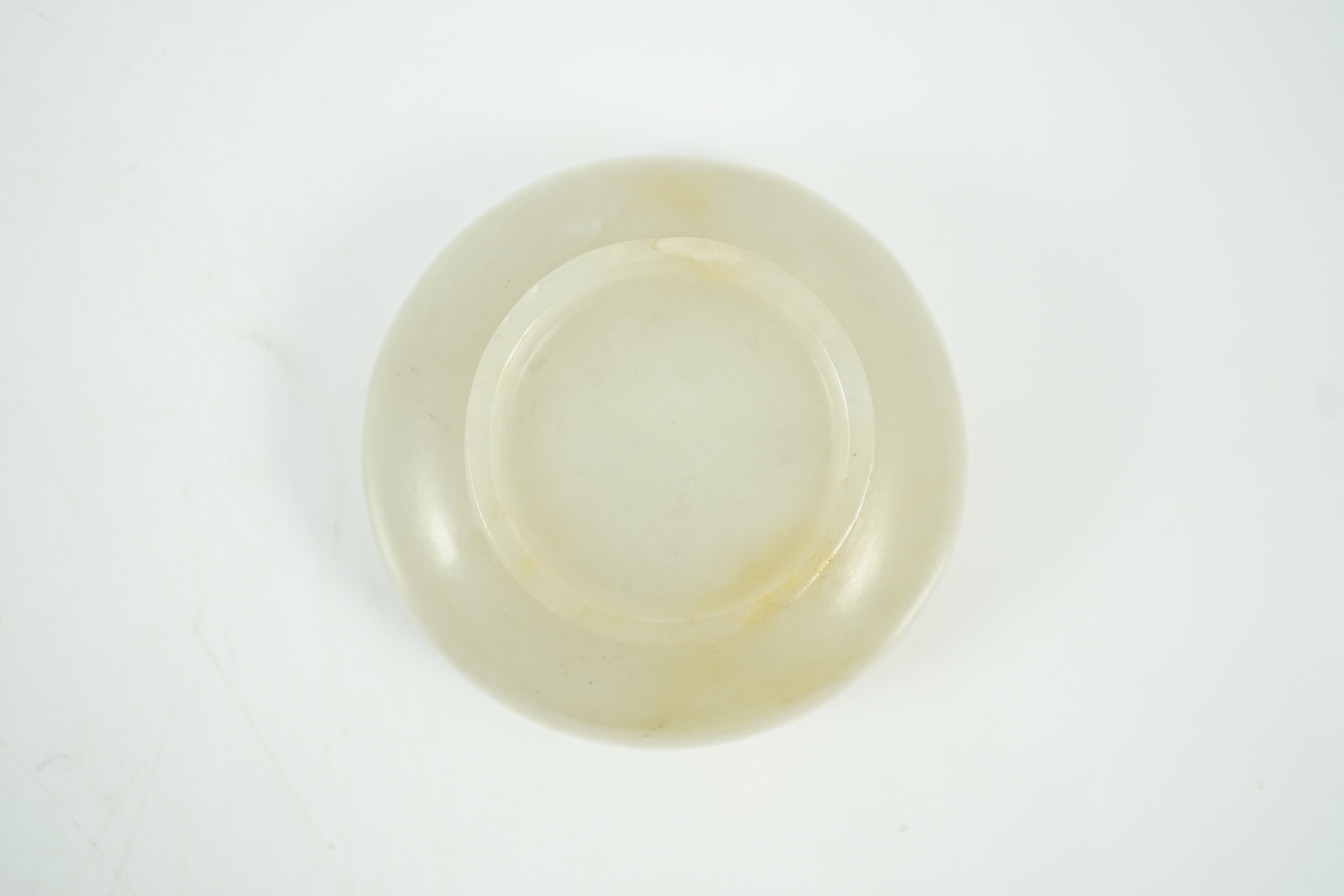 A Chinese pale celadon jade cup, Qing dynasty